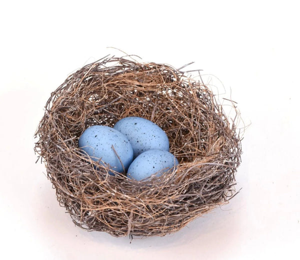 Nest with faux blue eggs